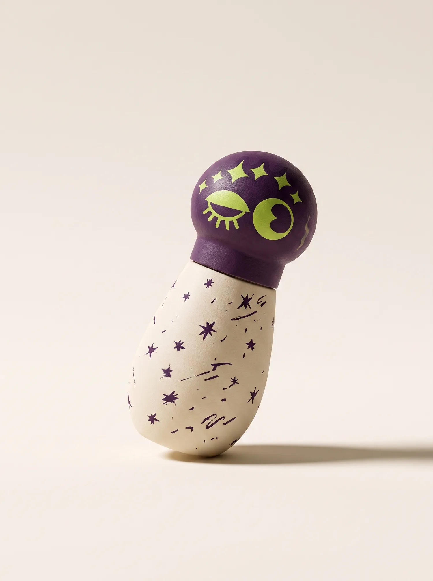 Cream-bodied Fizzlé dropper with a plum head and lime wink