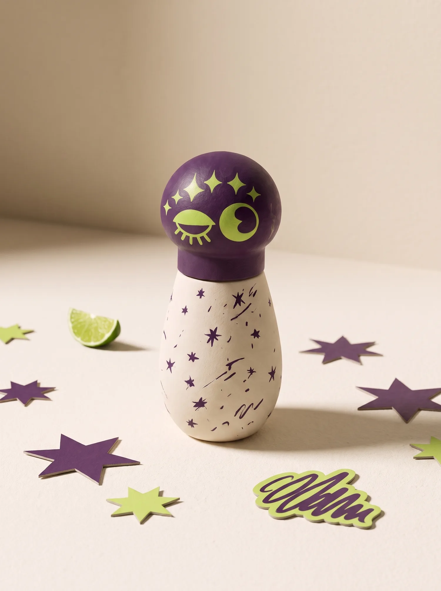 Plum Fizzlé dropper with the lime wink printed on the dome