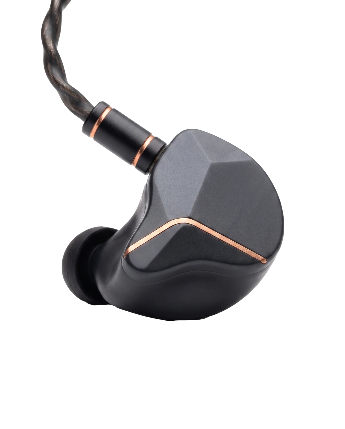 A single NUMEN IEM in-ear monitor — graphite resin shell with a copper chevron