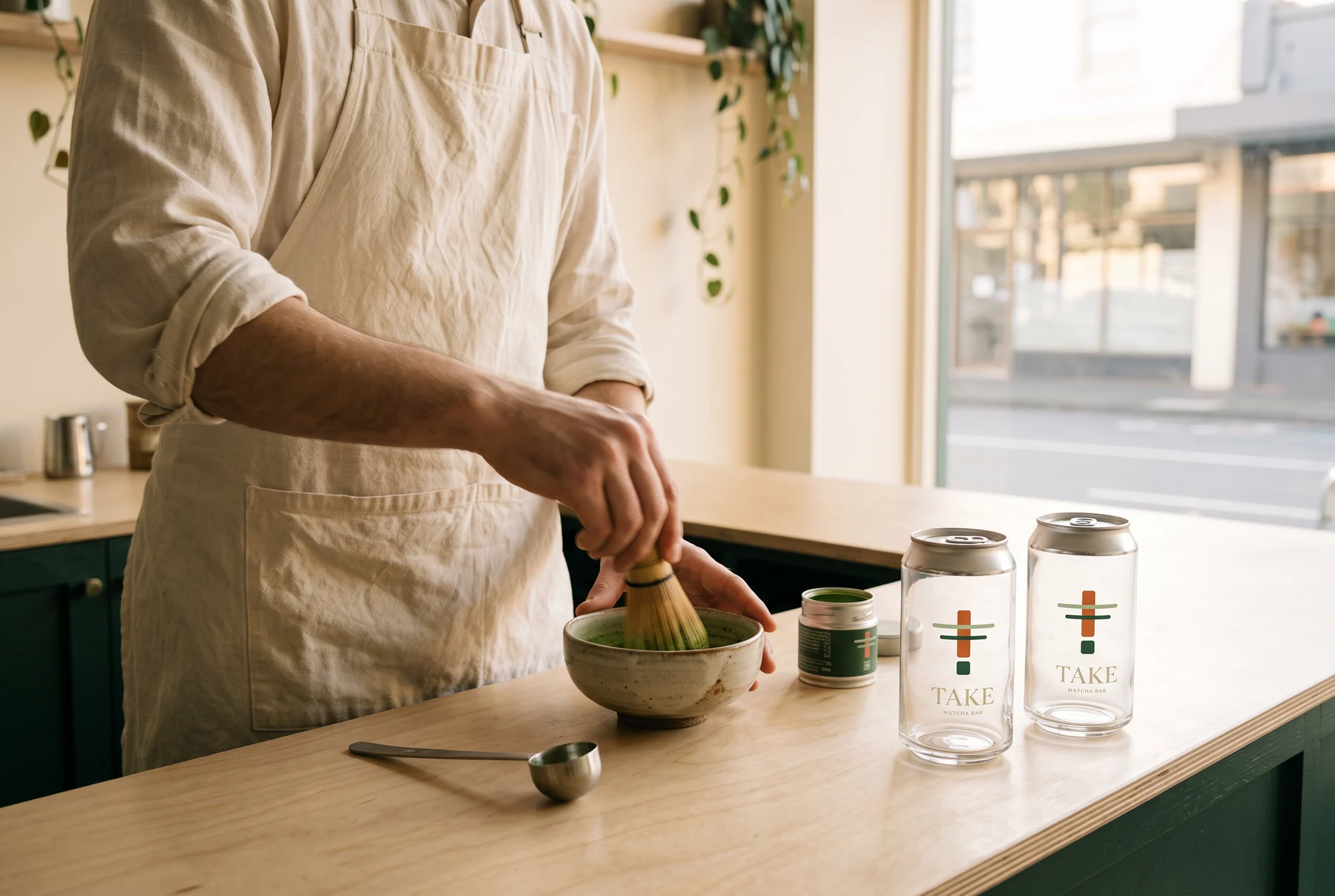 TAKE — whisking behind the bar